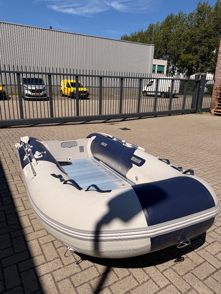 Rubberboot met aluminium bodem + 6 PK Suzuki, Watersport en Boten, Aluminium, Peddels, 6 pk, Zo goed als nieuw
