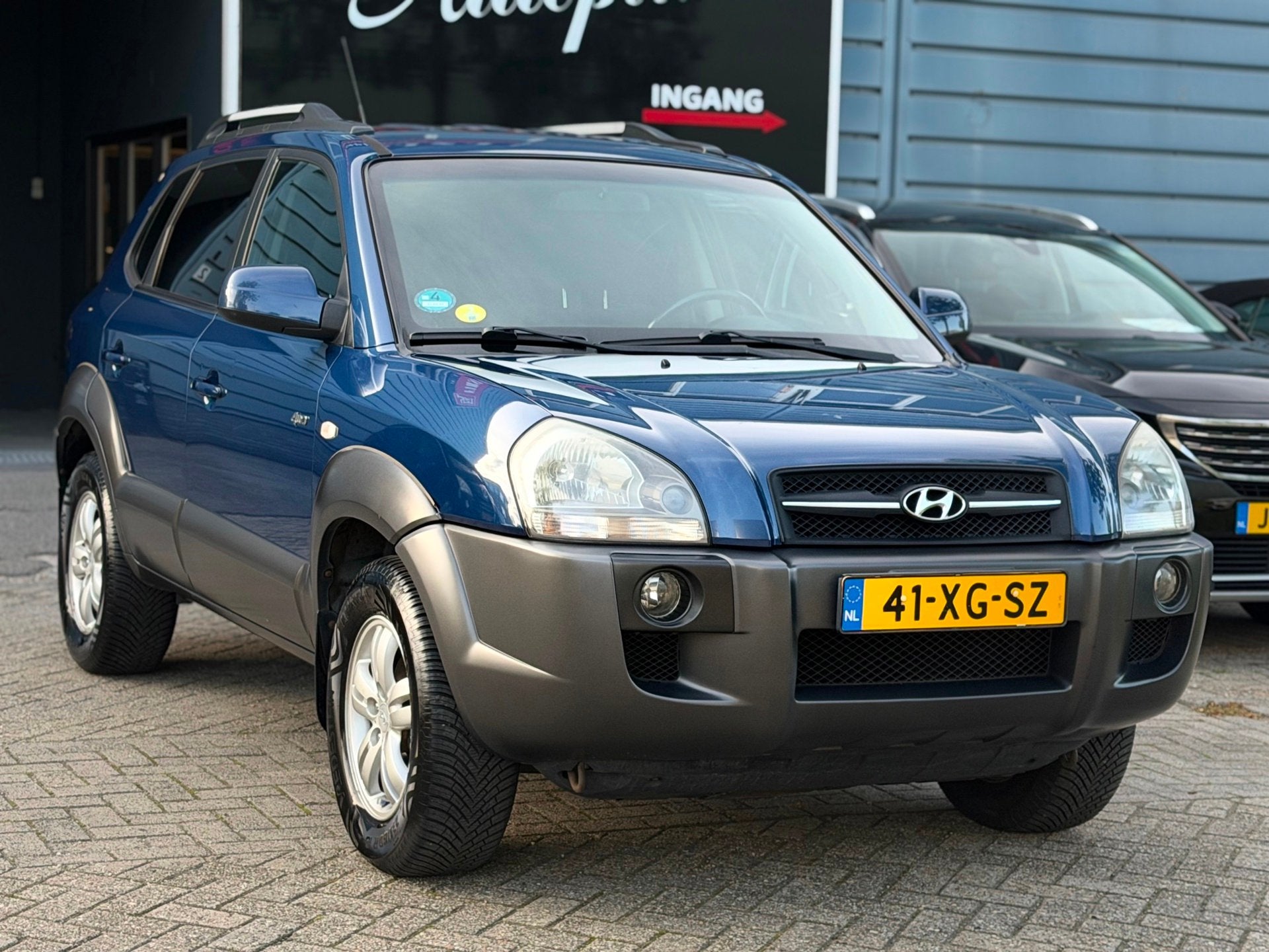 Hyundai Tucson 2.0i 4WD Style AIRCO/CRUISE/TREKHAAK | INRUIL, Auto's, Automatische klimaatregeling, Stof, Gebruikt, 4 cilinders