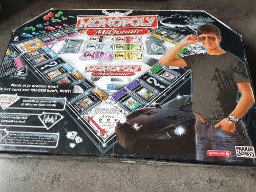 Monopoly Miljonair Bordspel - Zo goed als nieuw, Hobby en Vrije tijd, Gezelschapsspellen | Bordspellen, Drie of vier spelers, Ophalen of Verzenden