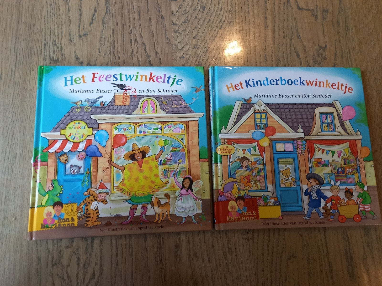 Het kinderboekwinkeltje en het feestwinkeltje, Ophalen of Verzenden, Zo goed als nieuw