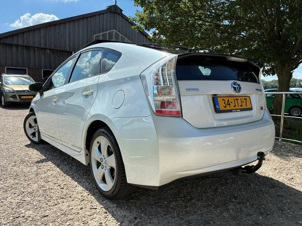 Toyota Prius 1.8 Dynamic | Solar roof + Pano + Xenon + Navi, Auto's, Toyota, Gebruikt, 4 cilinders, Alcantara, Wit