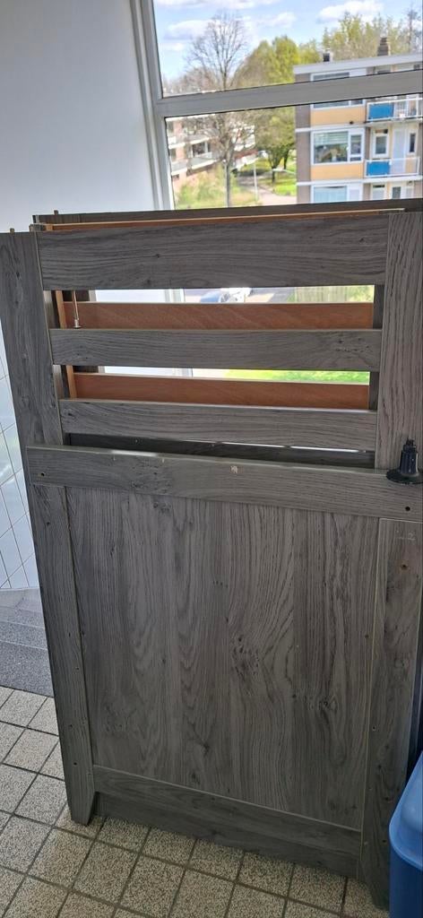 Ledikant grijs hout, Ophalen