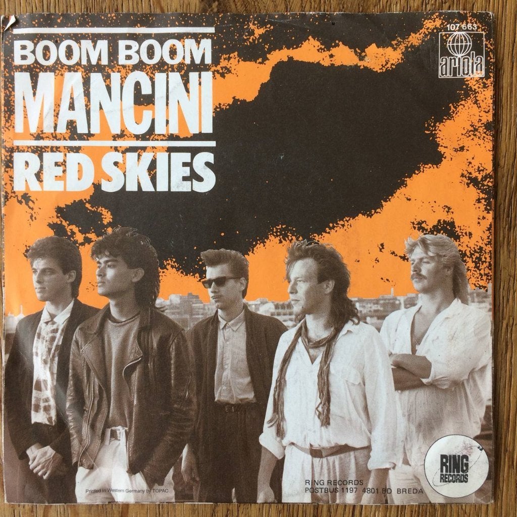 Boom Mancini Red Skies 7" Den Haag nederpop 80 Urban Heroes, Gebruikt, 7 inch, Ophalen of Verzenden, Rock en Metal