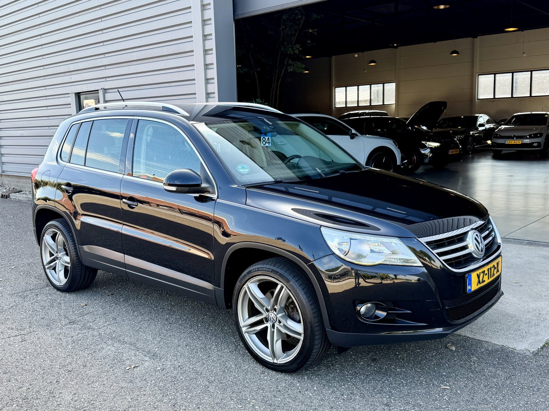 Volkswagen Tiguan 1.4 TSI Sport&Style Clima|Cruis|Carplay Zw, Auto's, Euro 5, 4 cilinders, 150 pk, Zwart