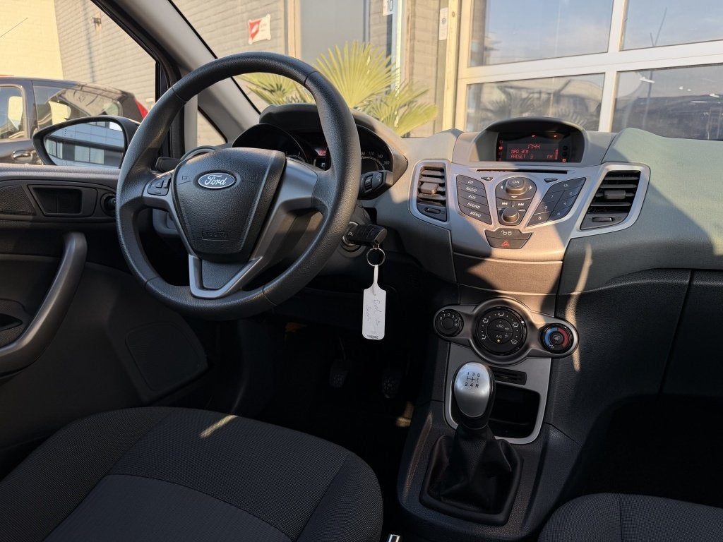 Ford Fiesta 1.25 Limited 5drs Clima Origineel NL NAP! Inruil, Auto's, Euro 5, Stof, 1242 cc, 4 cilinders