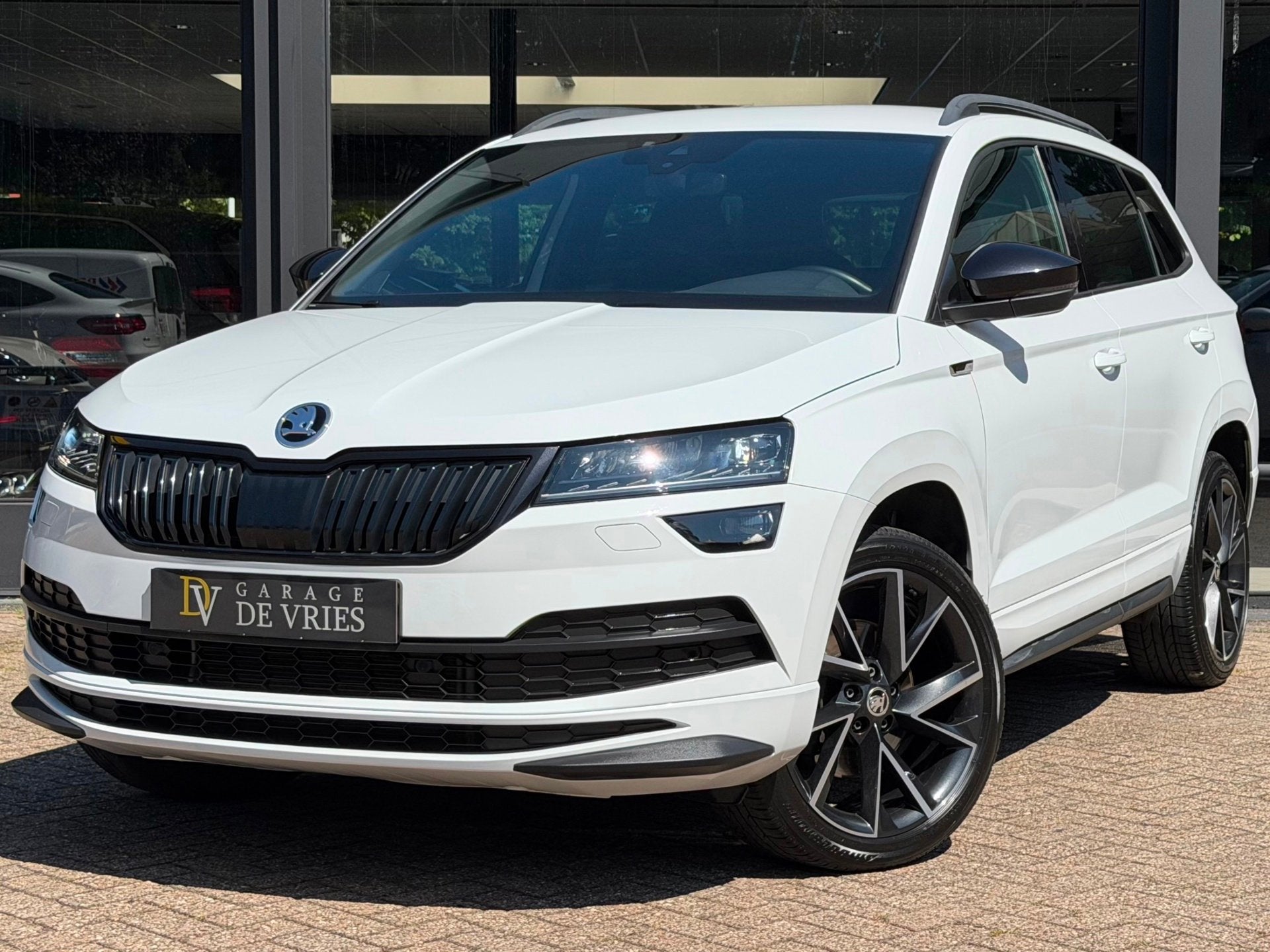 Skoda Karoq 2.0 TSI 4x4 Sportline ACC Virtual Full Option 20, Automaat, Stof, Gebruikt, 1465 kg