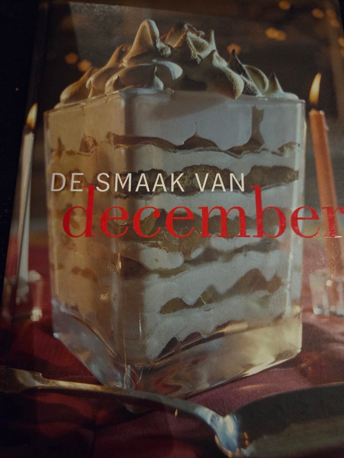 De smaak van december, Ophalen of Verzenden, Zo goed als nieuw