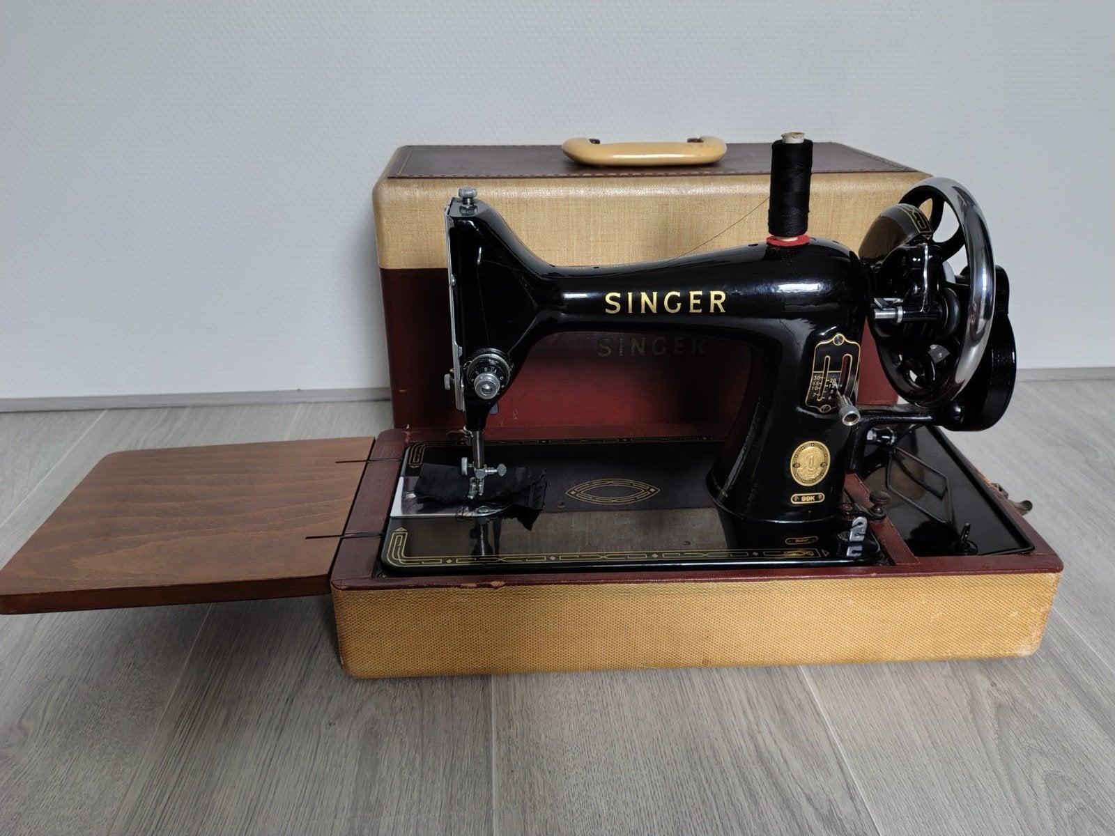 Singer hand naaimachine, Ophalen