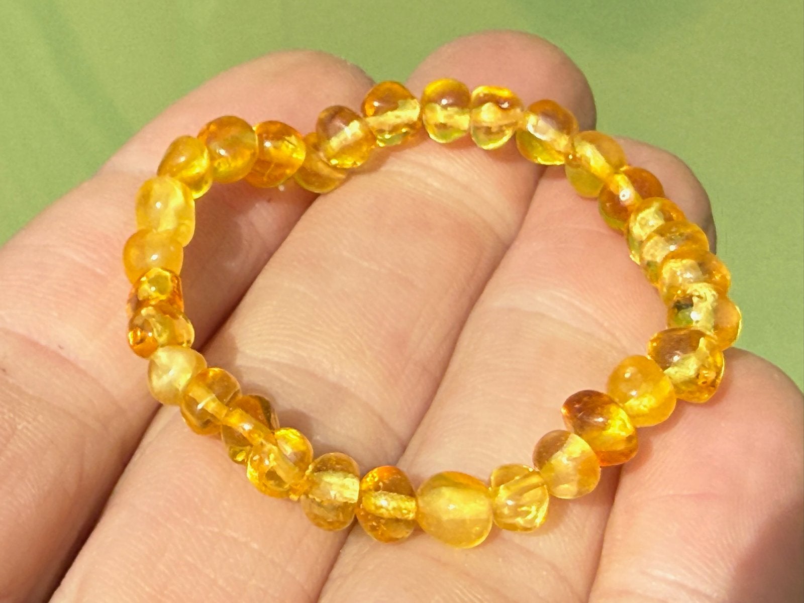 Barnsteen armband enkelbandje baby, Ophalen of Verzenden, Mineraal