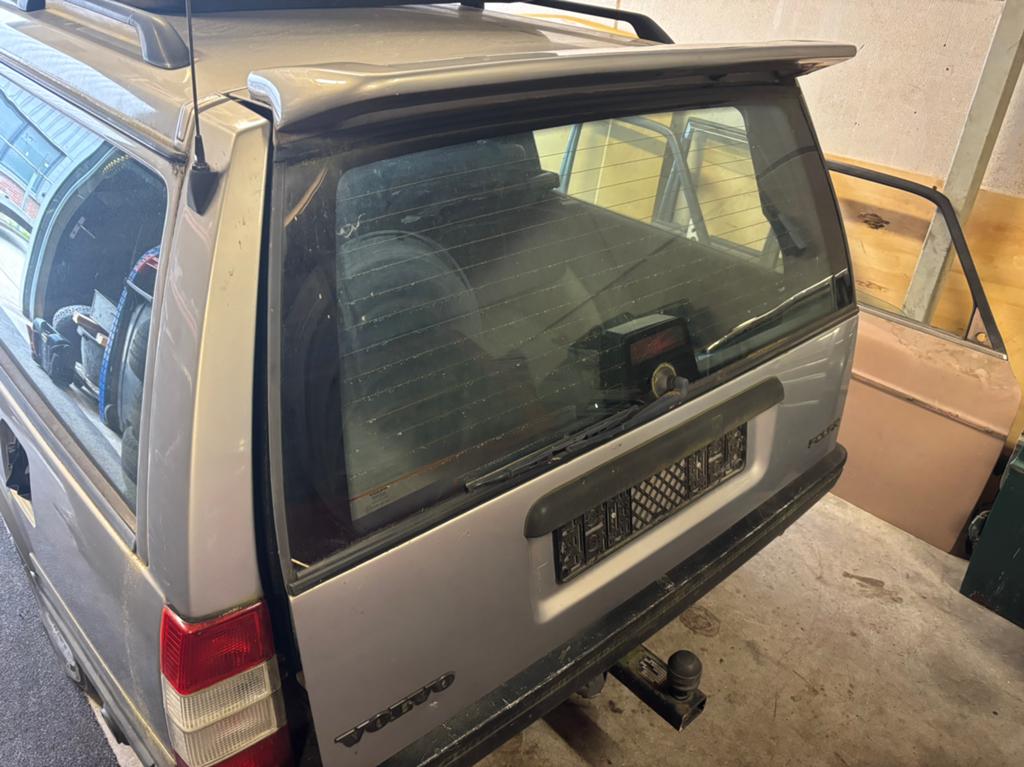 Achterklep spoiler volvo 940 station, Ophalen