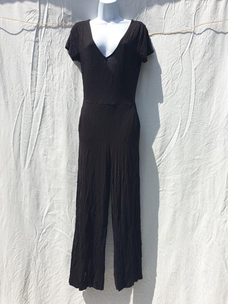 Leuke zwarte jumpsuit. Mt S Merk H&M, Kleding | Dames, Jumpsuits, ., Zwart, Ophalen of Verzenden, Zo goed als nieuw