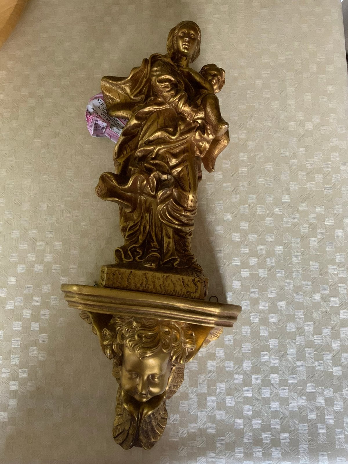 Maria en Jezus op een engelenconsole, Ophalen