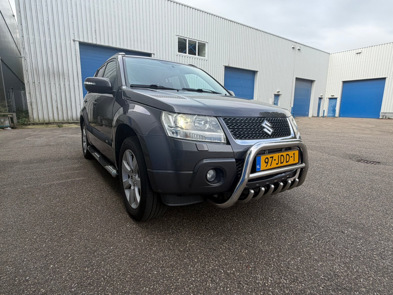 Suzuki Grand Vitara 2.4 5D AUT 2009 Grijs stoelverwa trekha, Auto's, Automaat, 4 cilinders, Grand Vitara, Vierwielaandrijving