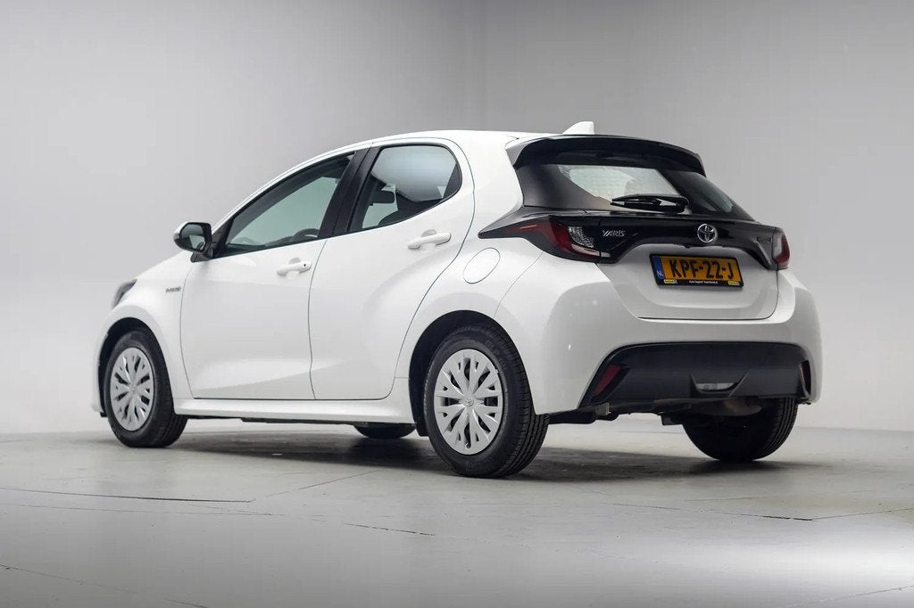 Toyota Yaris 1.5 Hybrid Business Aut [ Navi Adapt.cruise App, Auto's, 450 kg, Gebruikt, 450 kg, Wit
