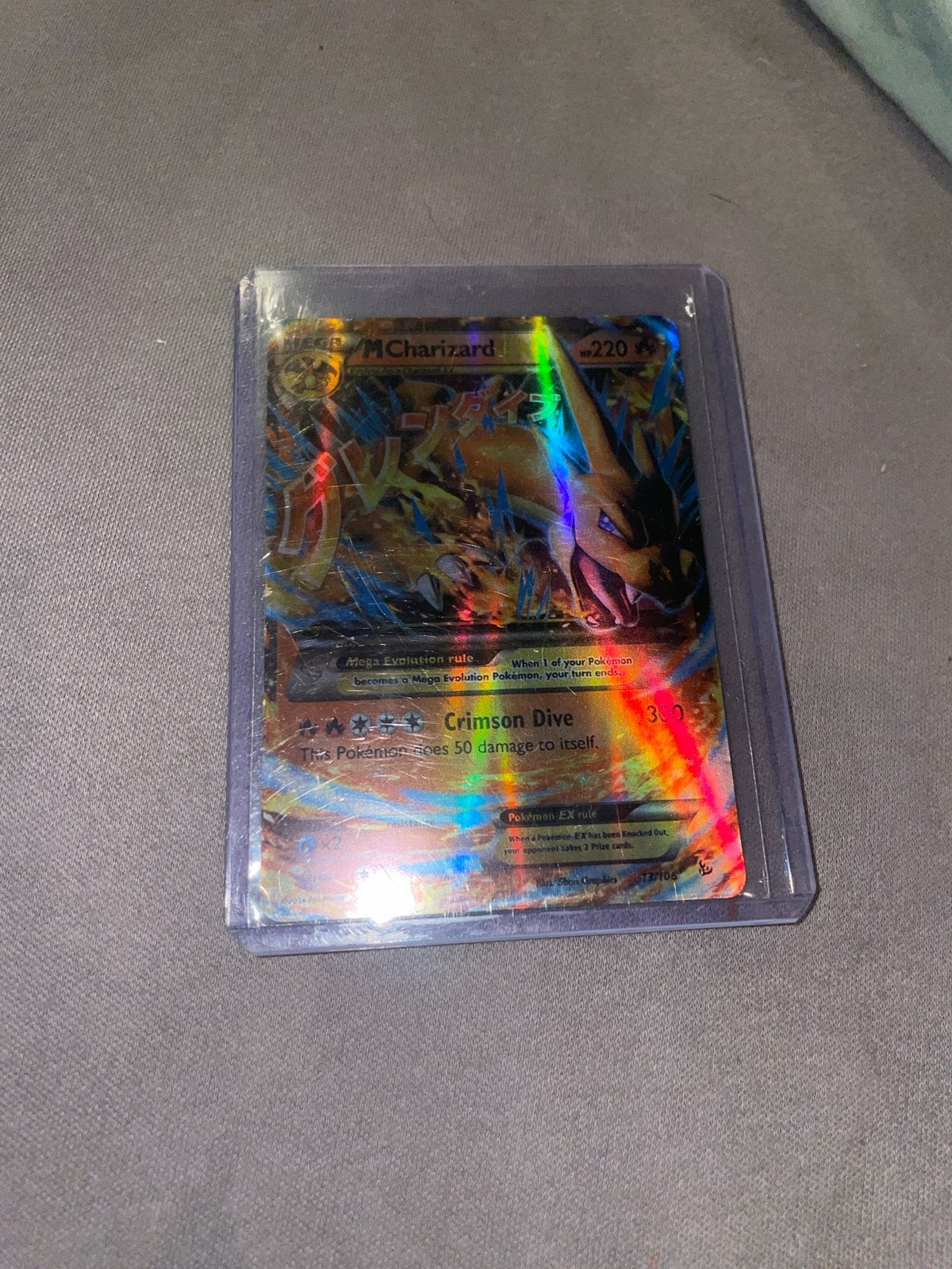 Pokémon M Charizard EX 220 HP Foil Kaart, Ophalen of Verzenden, Zo goed als nieuw, Losse kaart, Foil
