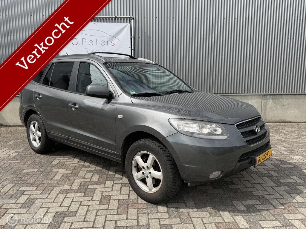 Hyundai Santa Fe 2.7i V6 Dynamic 2007 Navigatie / Bluetooth, Auto's, Hyundai, Voorwielaandrijving, Gebruikt, 2000 kg, Bedrijf