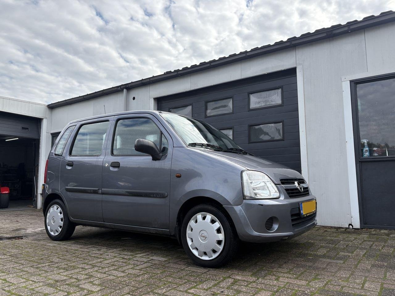 Opel Agila 1.2 16v flexx (bj 2004), Auto's, 1229 cc, Handgeschakeld, Zilver of Grijs, 955 kg