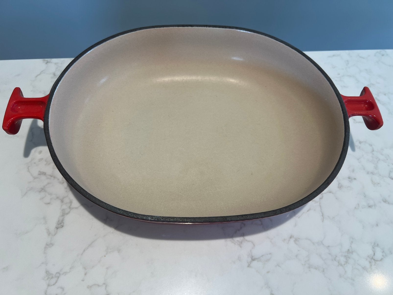 Le Creuset La Mama 29 cm ovenschaal Cerise in goede staat, Gietijzer, Overige typen, Le Creuset, Ophalen of Verzenden