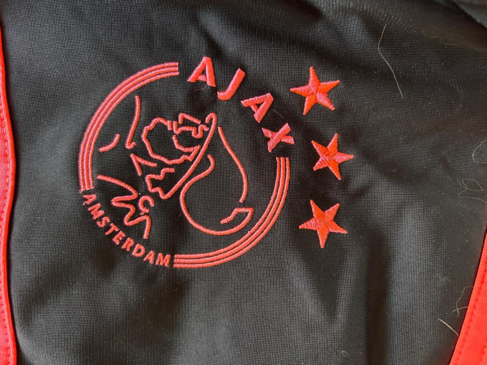 Ajax trainingspak zwart en roze, Maat 48/50 (M), Zwart, Ophalen of Verzenden, Voetbal