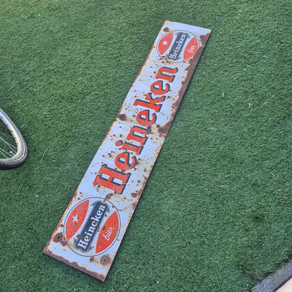 Vintage Heineken bier reclamebord - roestig en authentiek, Ophalen of Verzenden