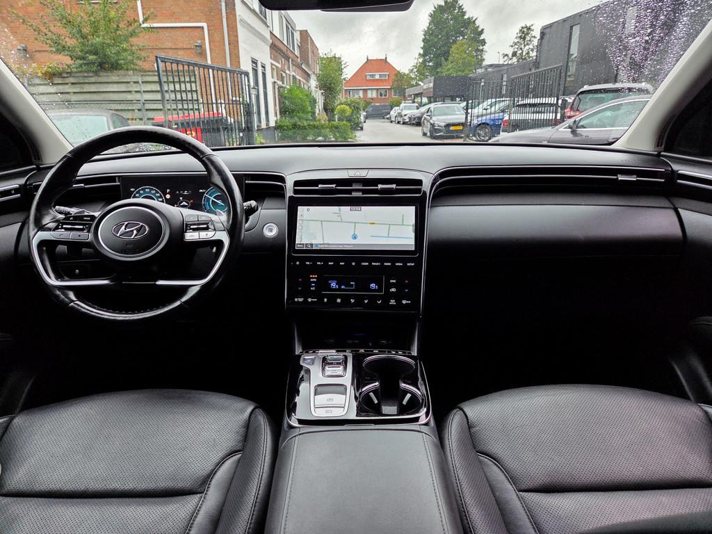 Hyundai Tucson 1.6 T-GDI 4WD PHEV AUT6 PREMIUM-SKY LEDER PAN, Auto's, Hyundai, Automaat, 1350 kg, Gebruikt, 4 cilinders