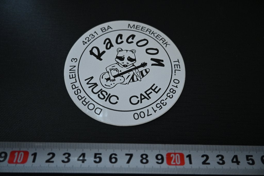 sticker Meerkerk  RACCOON Music Cafe Dorpsplein 3, Ophalen of Verzenden, Zo goed als nieuw