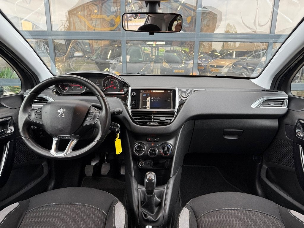 Peugeot 208 1.2 VTi Style/Airco/Cruise/Elek.Ramen/Pdc/Navi/L, Auto's, Peugeot, Voorwielaandrijving, Euro 5, Gebruikt, 31 €/maand