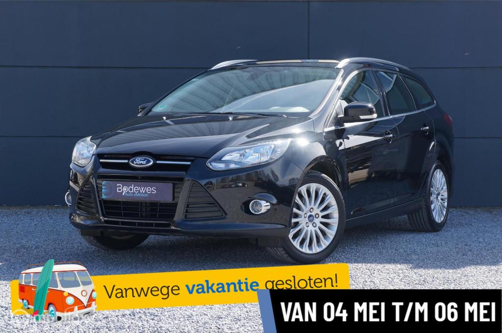 Ford Focus Wagon 1.6 TI-VCT Titanium met lage km stand, Auto's, Gebruikt, Zwart, 4 cilinders, Zwart