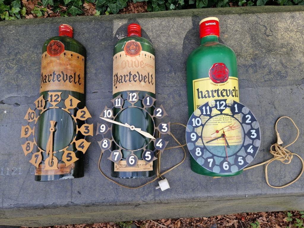 Hartevelt Leiden Jenever klokken, Ophalen of Verzenden, Gebruikt, Reclamebord