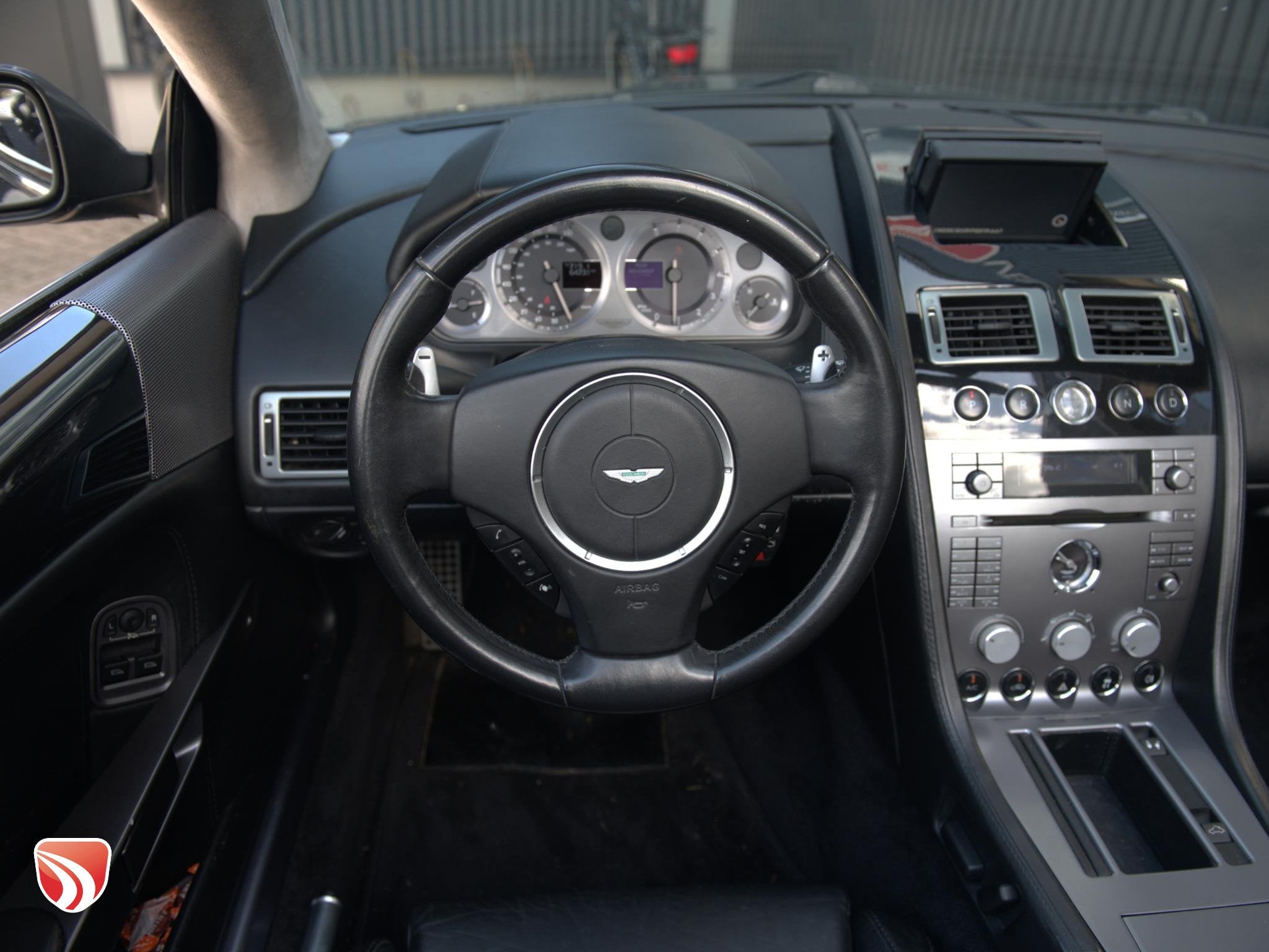 Aston Martin DB9 Volante 5.9 V12 Touchtronic 457pk | Dealero, Auto's, Automaat, 5935 cc, Zwart, Leder