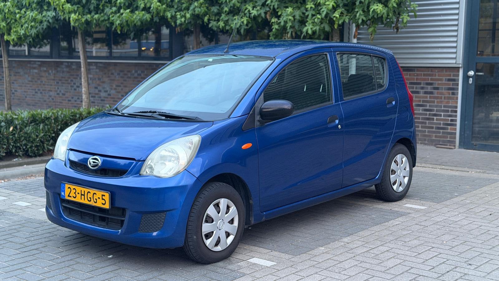 Daihatsu Cuore 1.0 5D 2008 Blauw 5 deurs, Auto's, Voorwielaandrijving, Stof, 600 kg, Zwart