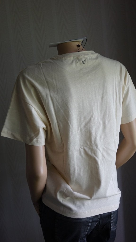 nieuwe creme NIKKIE shirt, Verzenden, Beige, Nieuw, Maat 34 (XS) of kleiner