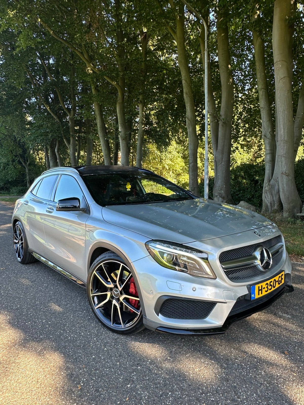 Mercedes-Benz GLA 45 AMG 4Matic Edition 1 PANO/MEMO/CARPLAY, Auto's, Zwart, Lichtsensor, 360 pk, 1485 kg