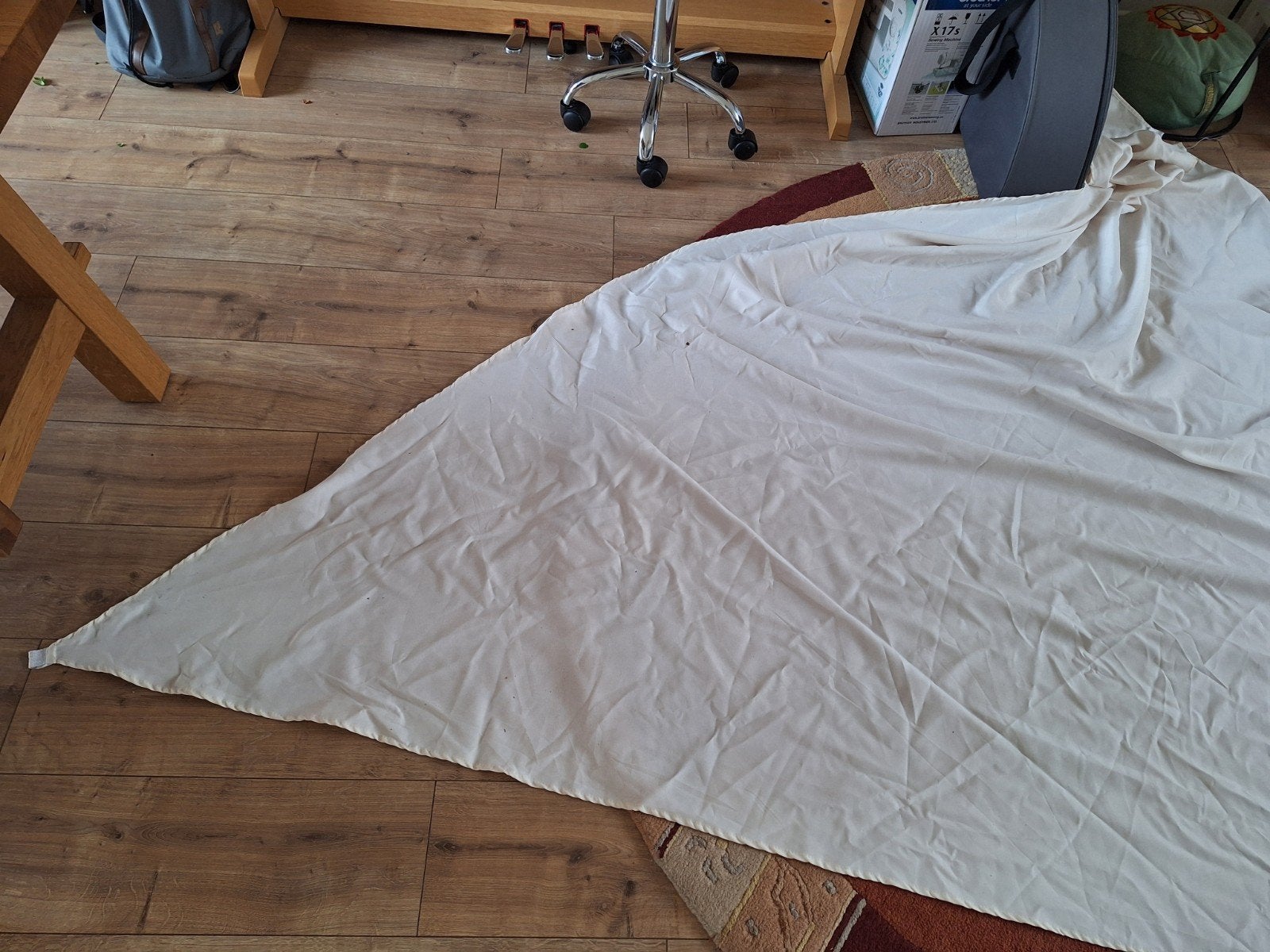 Gebroken wit schaduwdoek (driehoek 3.40m), Ophalen