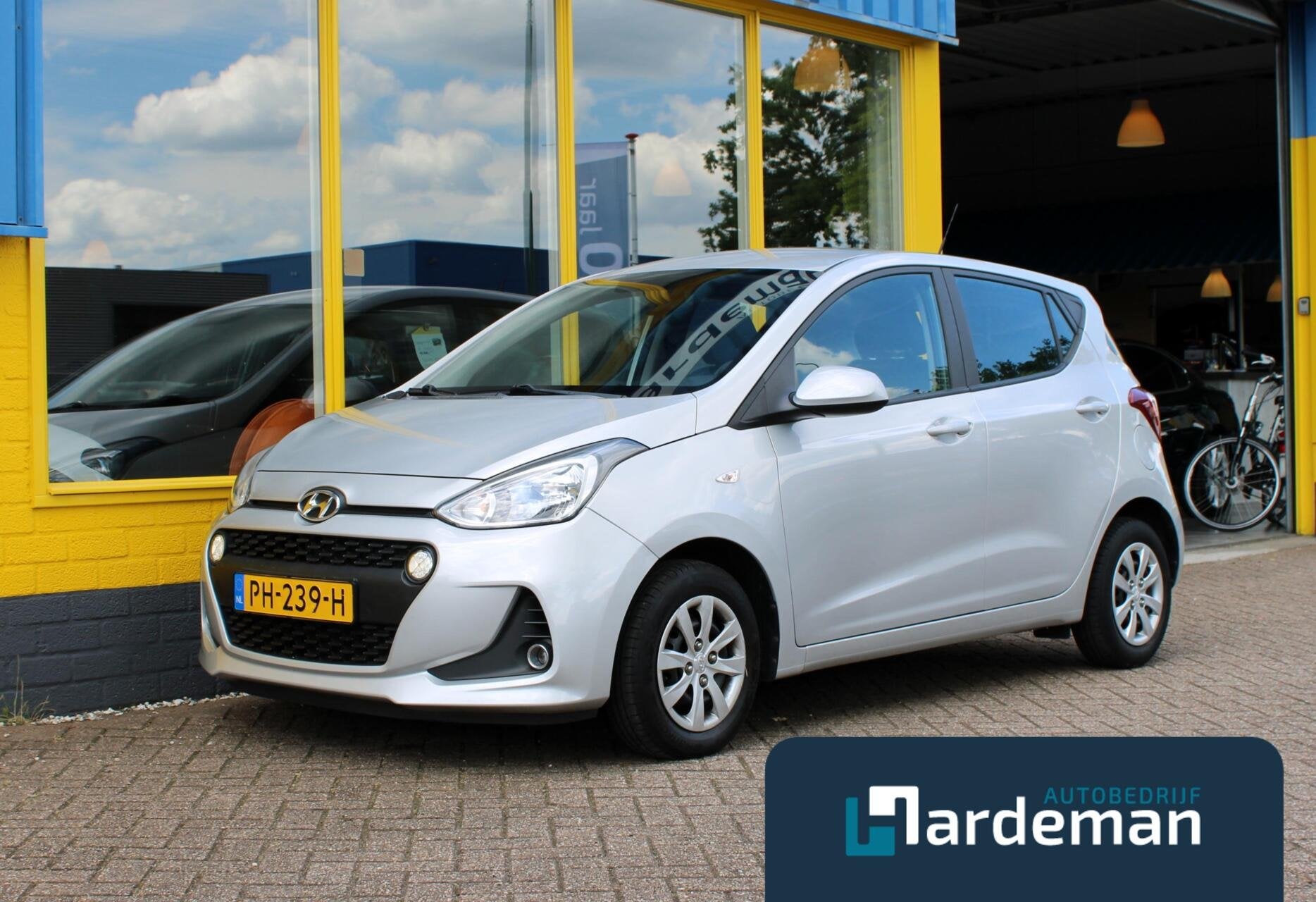Hyundai i10 1.0i i-Premium Carplay Cruise, Auto's, Voorwielaandrijving, Gebruikt, Met garantie (alle), 4 stoelen