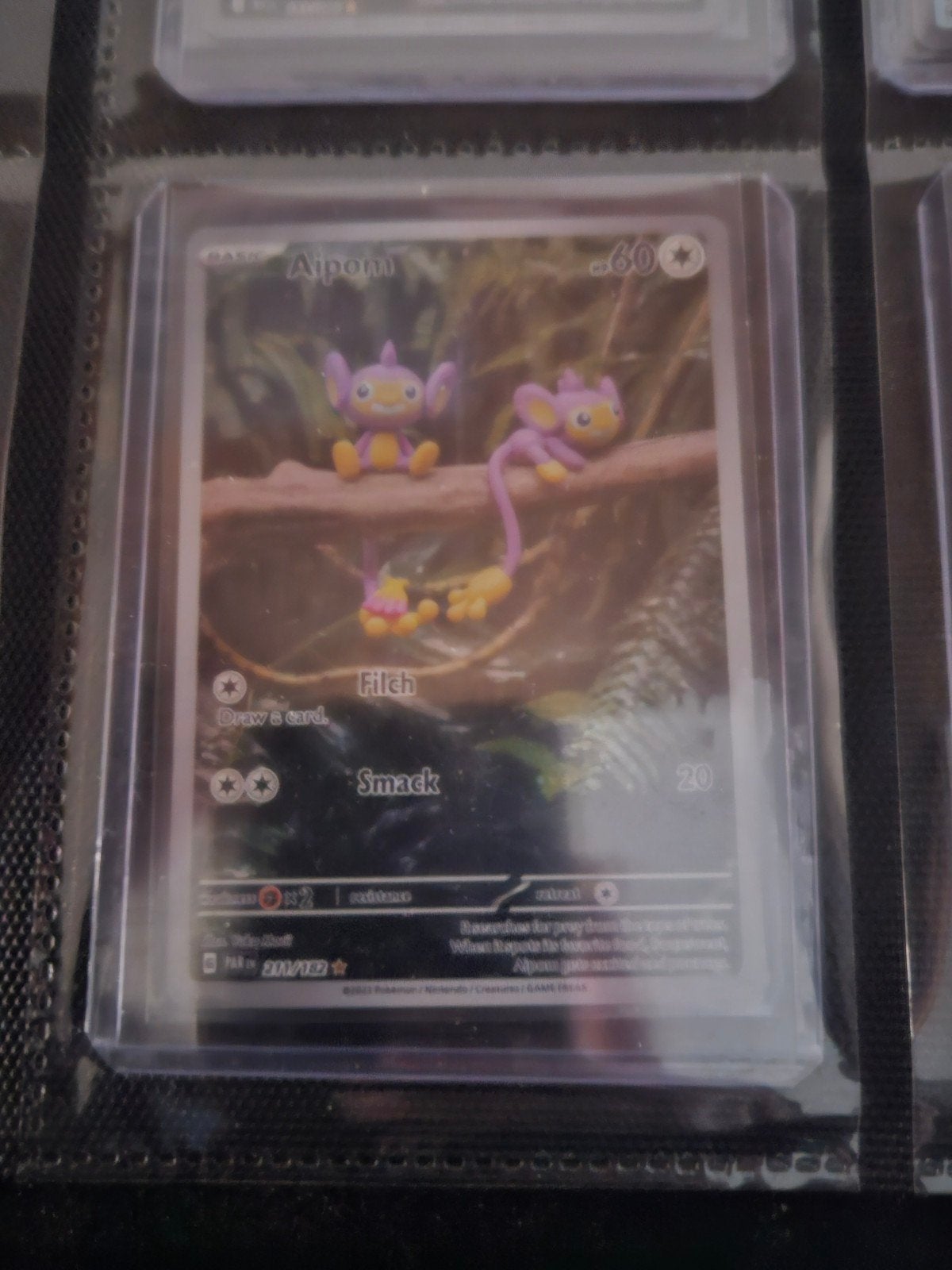 Pokemon Aipom 211/182 Paradox Rift, Hobby en Vrije tijd, Verzamelkaartspellen | Pokémon, Ophalen of Verzenden, Zo goed als nieuw