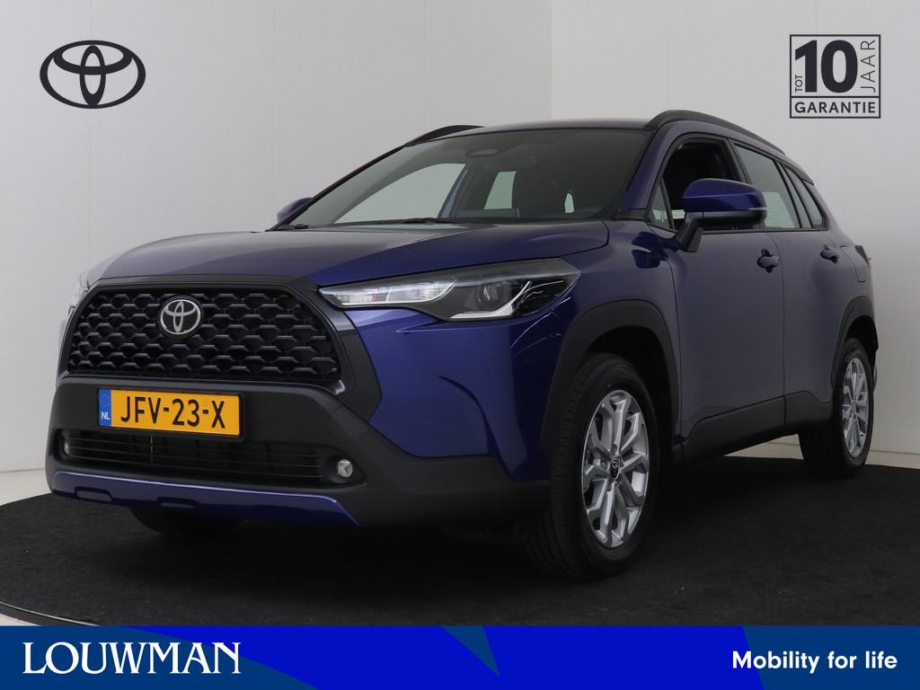 Toyota Corolla Cross Hybrid 140 Active (bj 2025, automaat), Auto's, Toyota, 12 maanden, Stof, Blauw, Origineel Nederlands