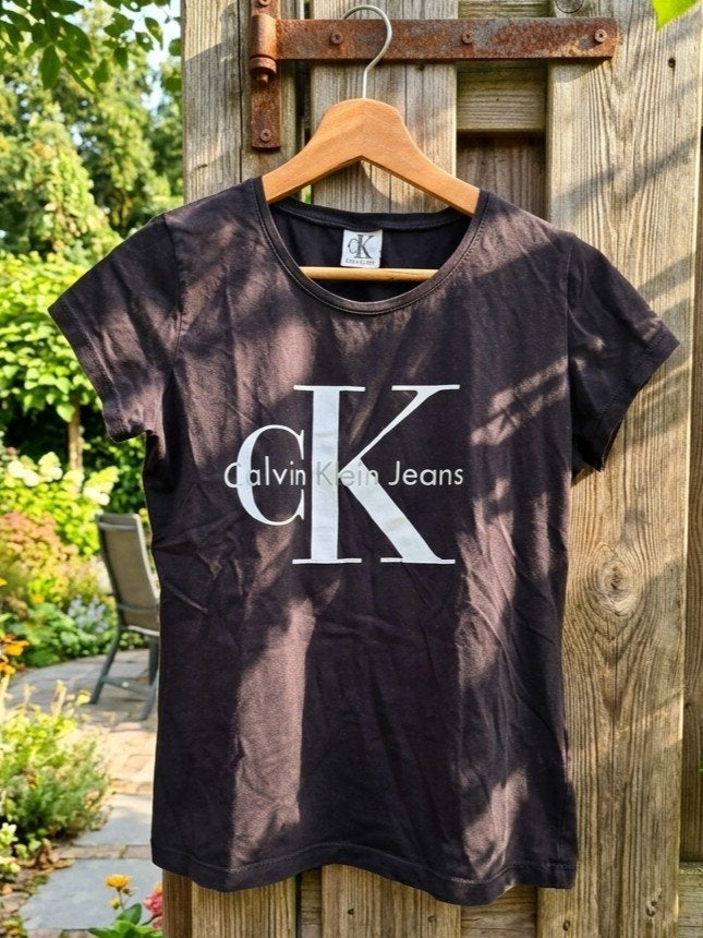 Vintage zwart Calvin Klein Jeans dames T-shirt, Zwart, Maat 42/44 (L), Ophalen of Verzenden, Zo goed als nieuw