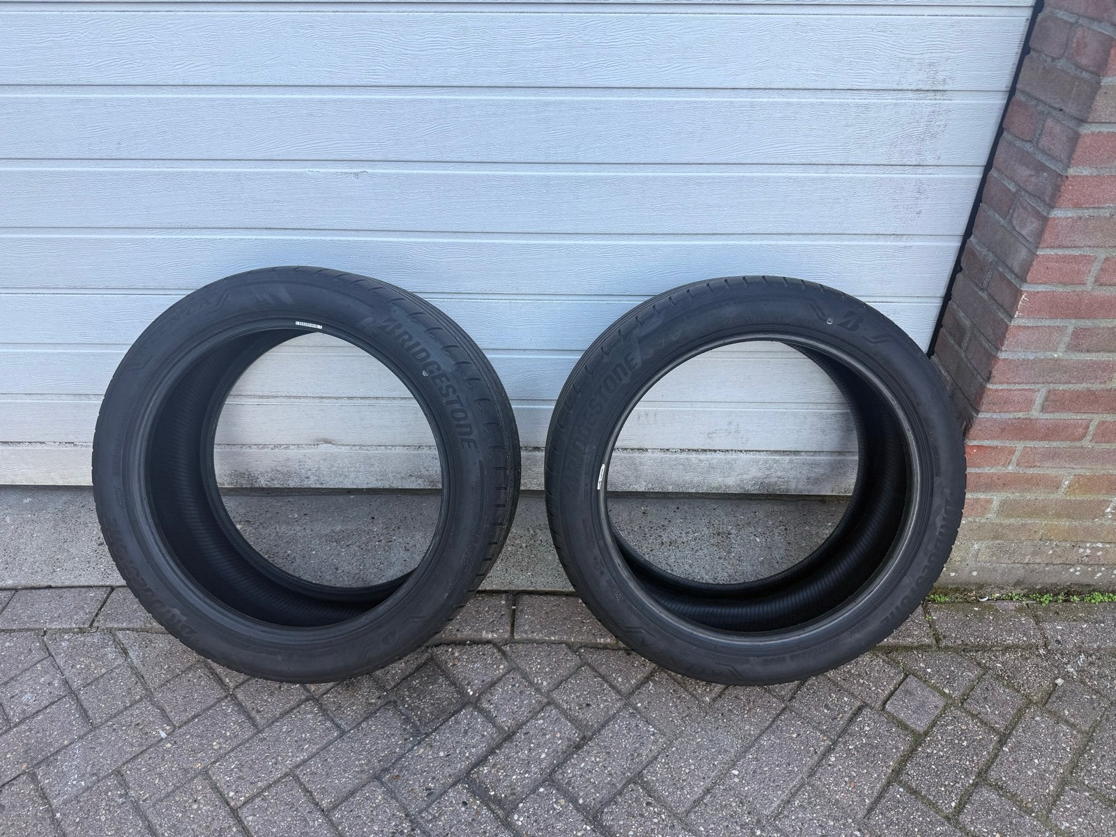 2x Bridgestone Alenza 001 zomerbanden 275/40R20 BMW, Ophalen, Gebruikt, 275 mm, Band(en)