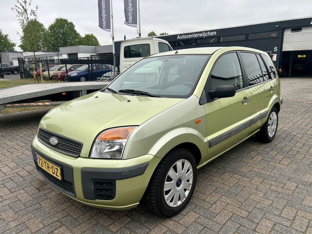 Ford Fusion 1.4-16V Champion - Nwe Apk (bj 2007), Auto's, Ford, Voorwielaandrijving, 15 km/l, Gebruikt, Metallic lak
