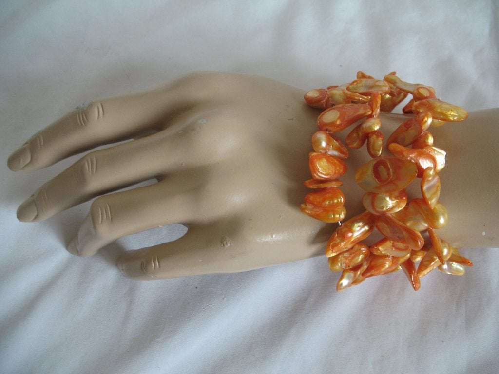 Armband Spiraal Kralen Honinggeel Zolderopruiming., Ophalen of Verzenden, Zo goed als nieuw, Overige materialen