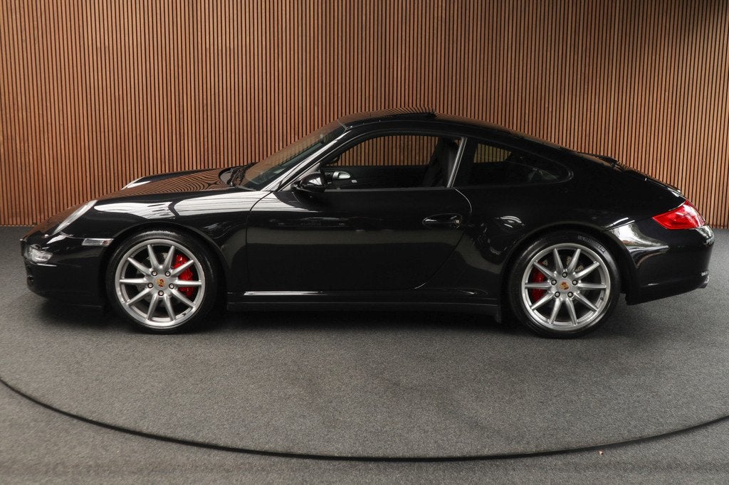 Porsche 911 3.8 Carrera 4S Open dak Bose Alcantarahemel Navi, Automaat, Gebruikt, Zwart, 4 stoelen