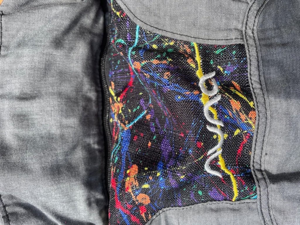 NUNA DRAAGZAK – GEORGETTE POLIZZI RAINBOW COLLECTION, Kinderen en Baby's, Buik of Rug, Zo goed als nieuw, Draagzak, Ophalen