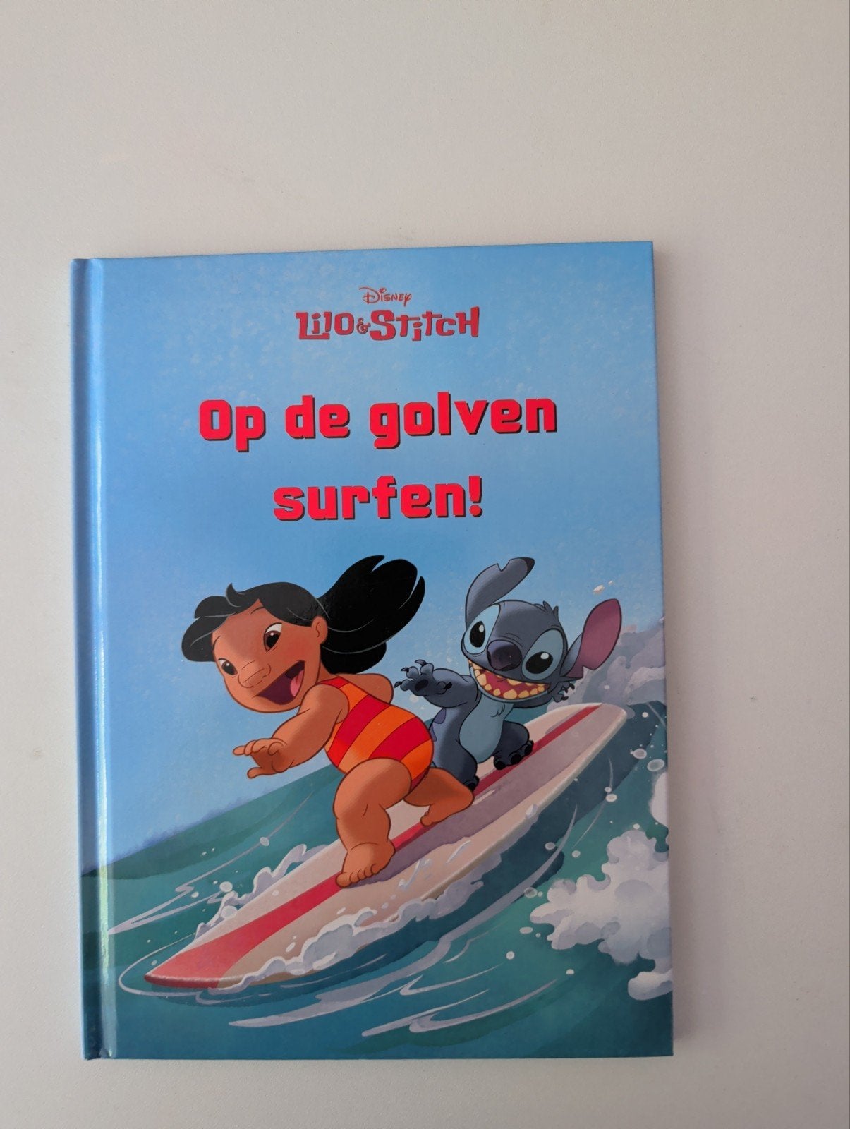 Disney Lilo & Stitch: Op de golven surfen!, Ophalen of Verzenden, Zo goed als nieuw, Disney, Fictie algemeen