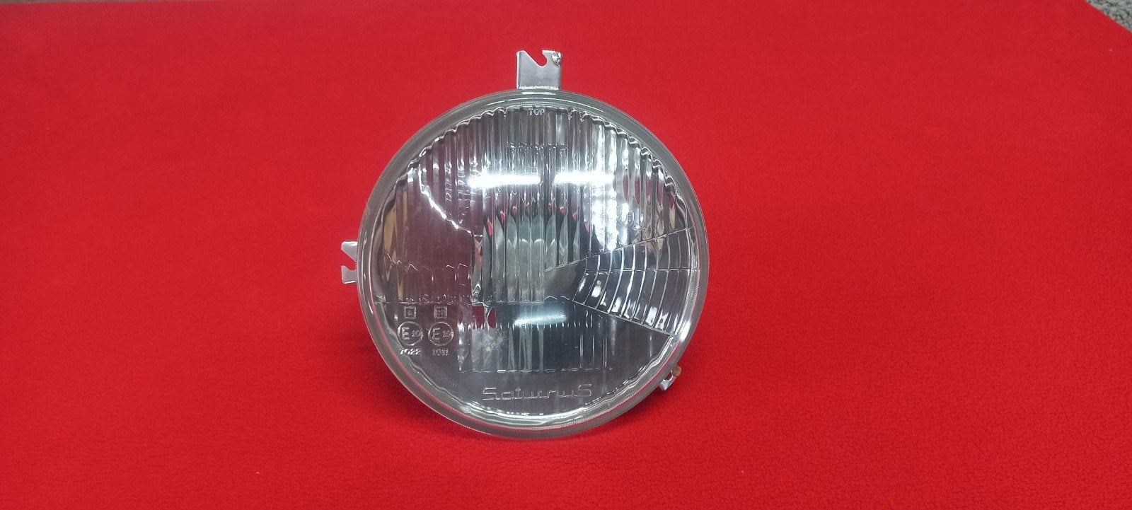 Saturnus Ronde Koplamp N.O.S. Ford Escort MK2, Ophalen of Verzenden, Nieuw, Ford