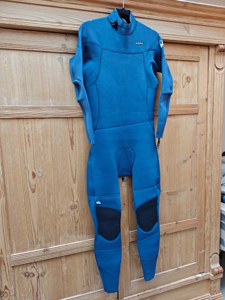 Quiksilver 3/2 mm wetsuit maat L - back zip + cap en wax, Ophalen, Maat 52/54 (L), Blauw, Overige typen