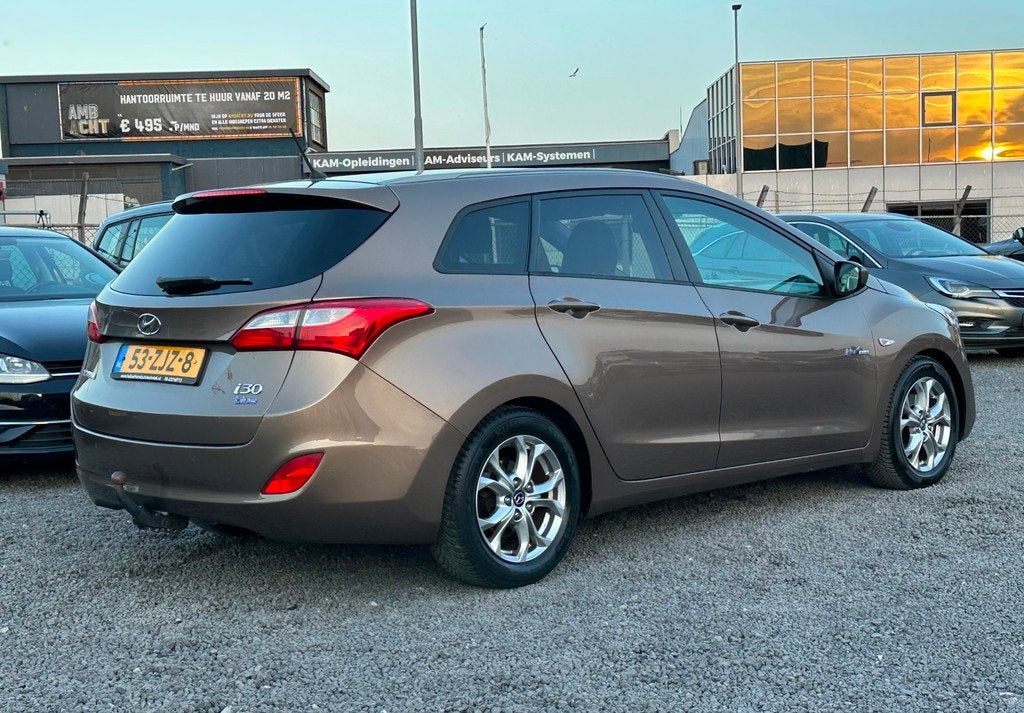 Hyundai I30 Wagon 1.6 GDI i-Motion/AIRCO/NAVI, Auto's, Hyundai, Voorwielaandrijving, Euro 5, Gebruikt, 4 cilinders