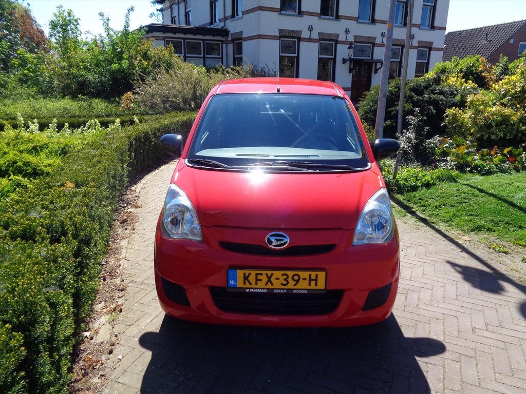 DAIHATSU Cuore 1.0 51KW 5D Comfort bij Daihatsu dealer met 1, Auto's, Automaat, 12 maanden, Stof, Zwart