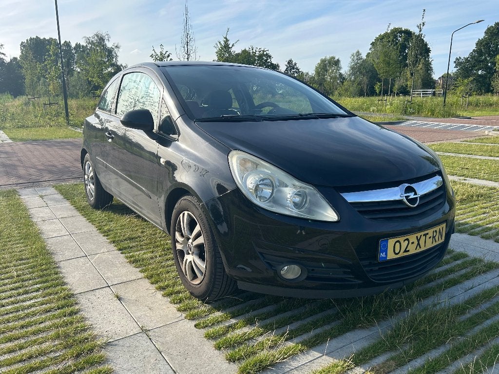Opel Corsa 1.2 16V 3D WR 2007 Zwart, Auto's, Opel, Voorwielaandrijving, 450 kg, 40 €/maand, Zwart