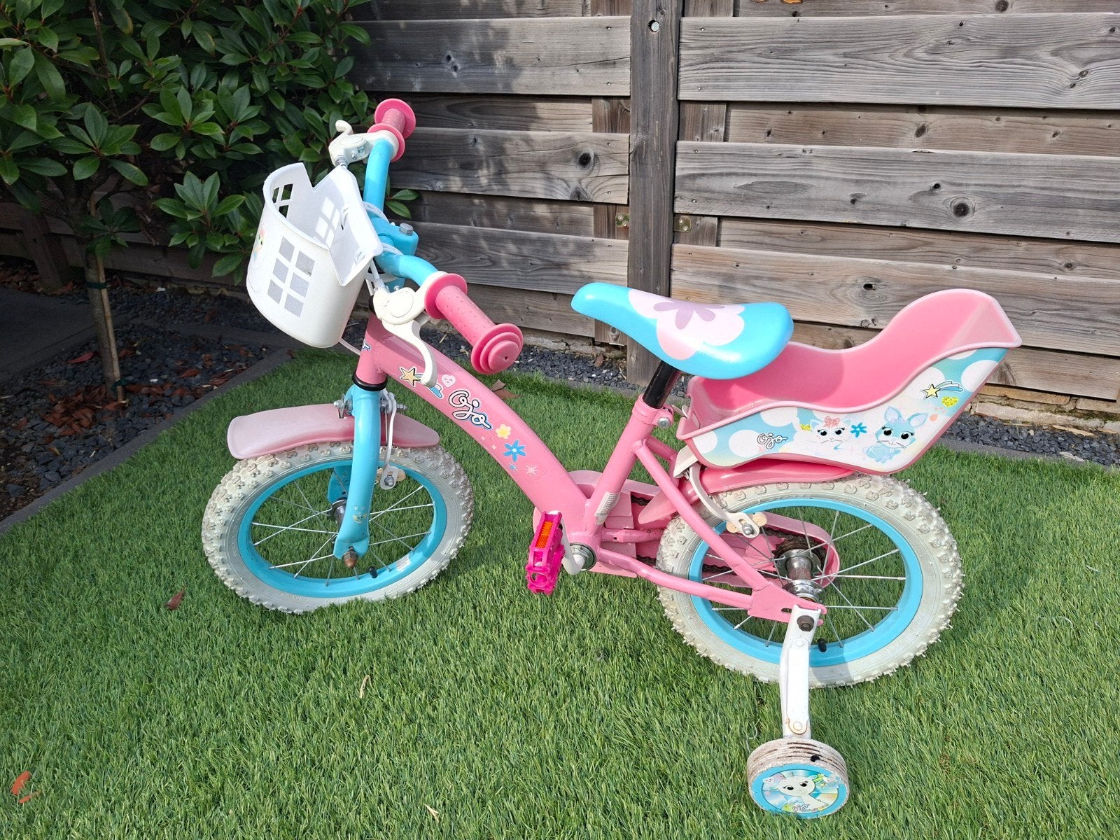 14 inch meisjesfiets met poppenstoeltje, mandje & zijwielen